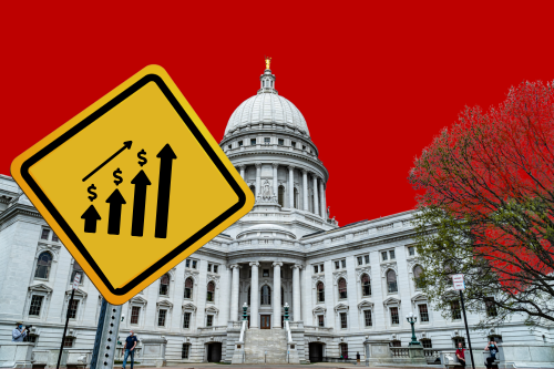 A caution sign in front of the Wisconsin Capitol
