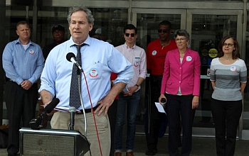 Executive Director Matt Rothschild and coalition members