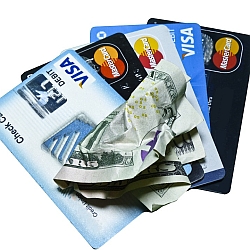 Crumpled money and credit cards