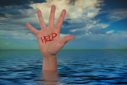 Hand Above Water