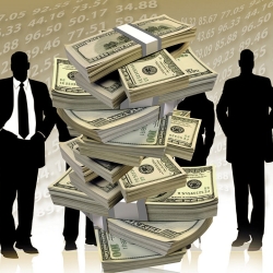 Stack of Money and Shadowy Figures
