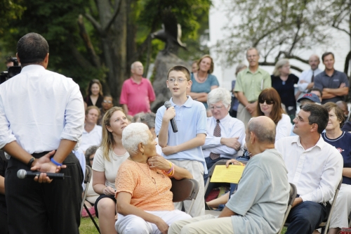 Boy asking questions of a candidate